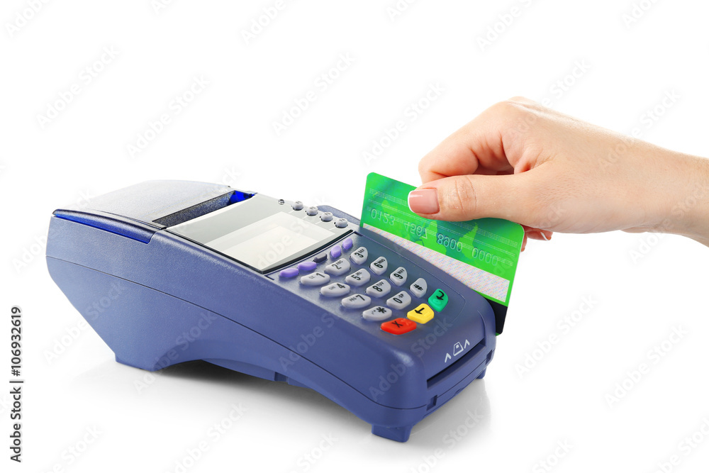 Female hand with credit card and bank terminal, isolated on white Female hand with credit card and bank terminal, isolated on white