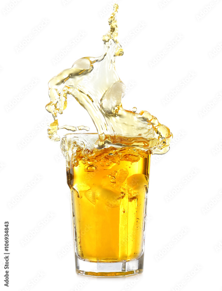 Ice tea with lemon splash, isolated on white Ice tea with lemon splash, isolated on white