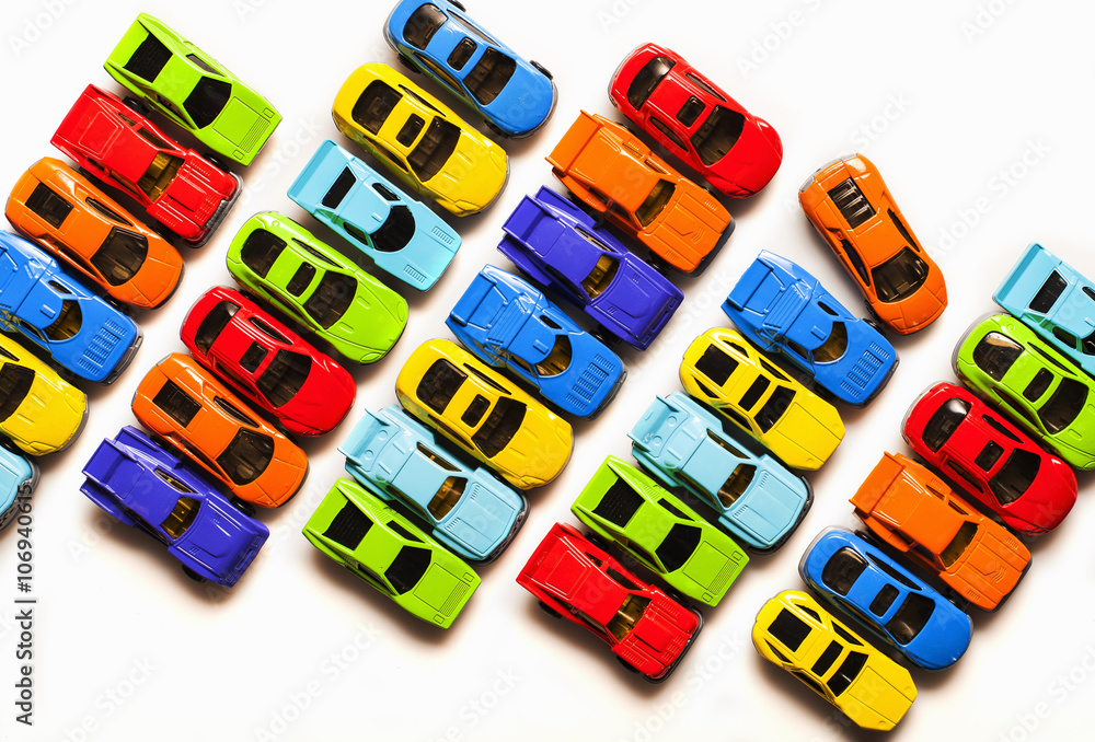 Still life with rows of colorful toy cars Still life with rows of colorful toy cars