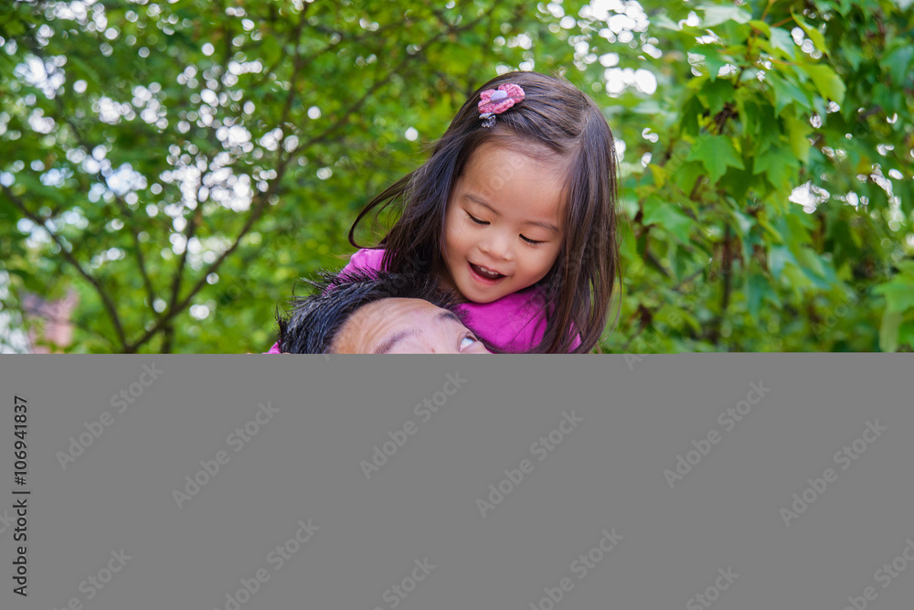 Mid adult father shoulder carrying toddler daughter Mid adult father shoulder carrying toddler daughter