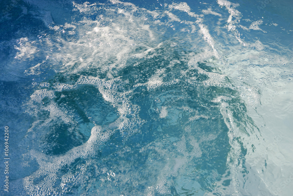Fototapeta premium background of rippled pattern of clean water in blue color