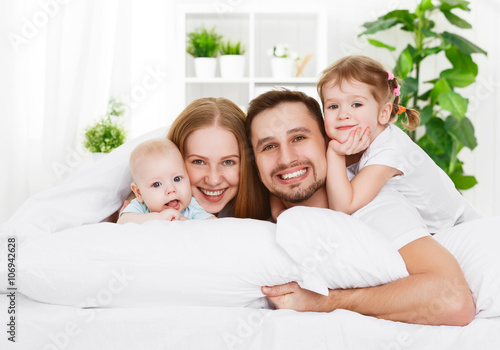 happy family at home in  the bed © JenkoAtaman