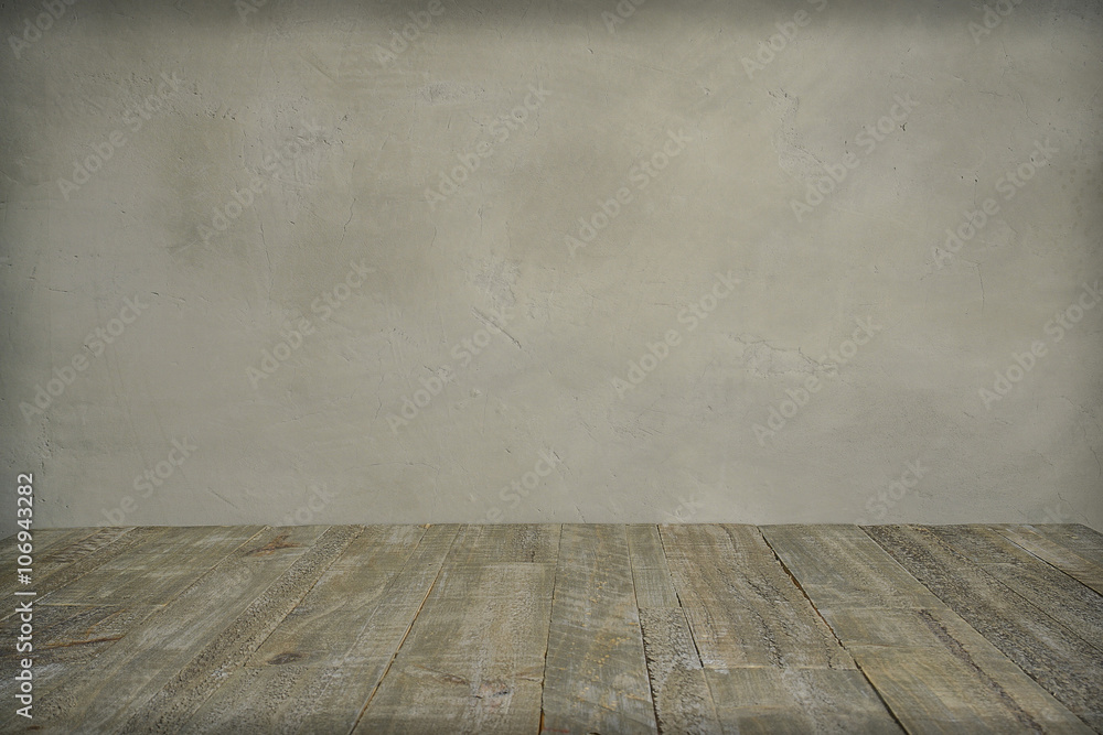 grungy concrete wall and wooden floor