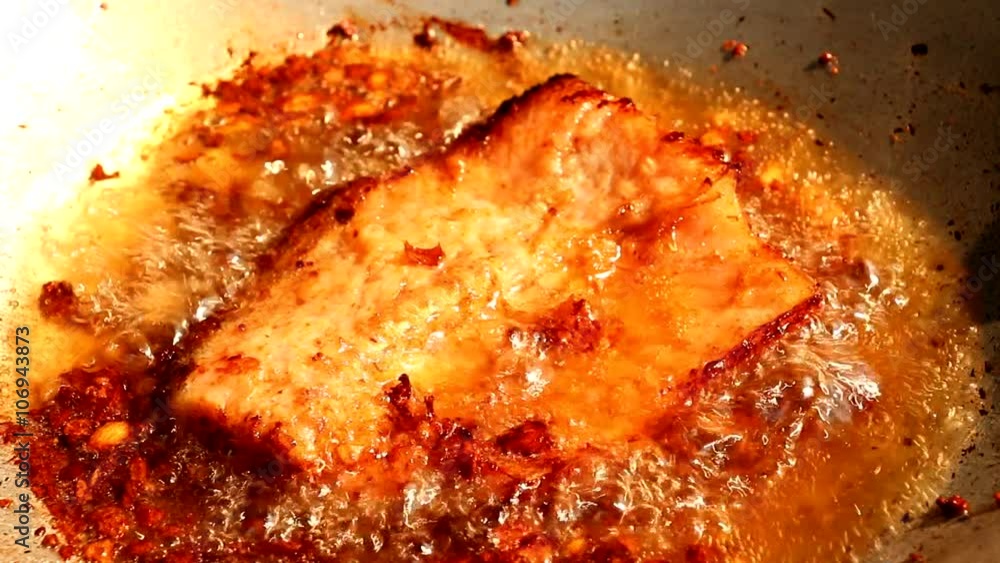 frying fish on pan frying fish on pan