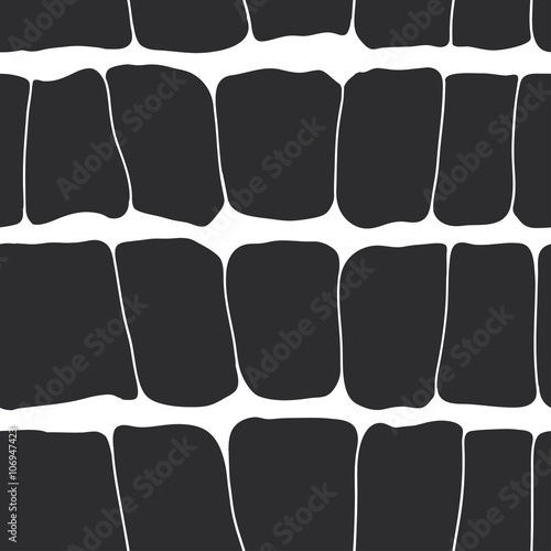 Reptile skin seamless pattern black spots on a white background.
