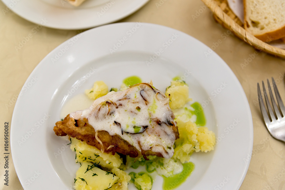 Boiled potatoes and cod in batter Boiled potatoes and cod in batter