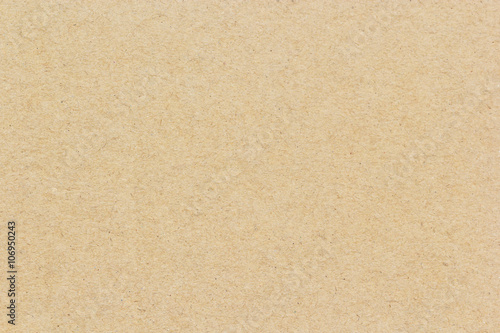 Brown cardboard background or texture photo