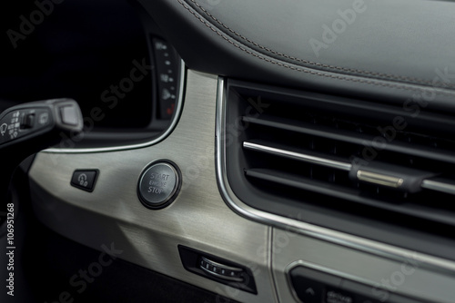 New car interior detail. Engine start and stop button. © alexdemeshko