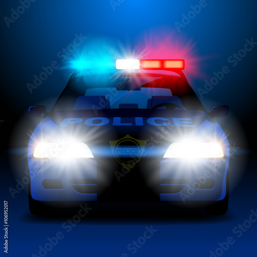 Police car in night with lights in frontal view