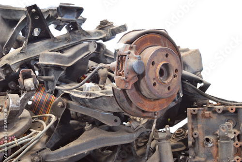 Obraz na plátně Close up of automotive garbage isolated on white background