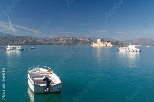 Boats in the bay of Nafplio, Peloponnese, Greece photo