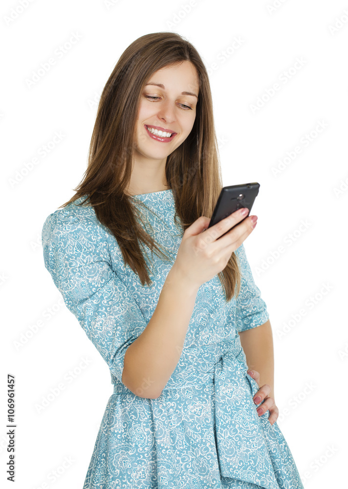Beautiful woman writes a message on the phone Beautiful woman writes a message on the phone