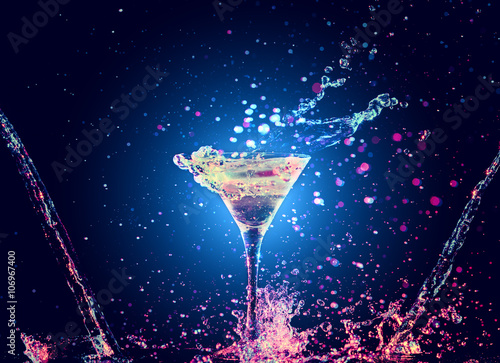 Colourful cocktail in glass with splash