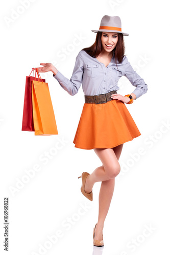 woman with shopping bags. Studio shoot