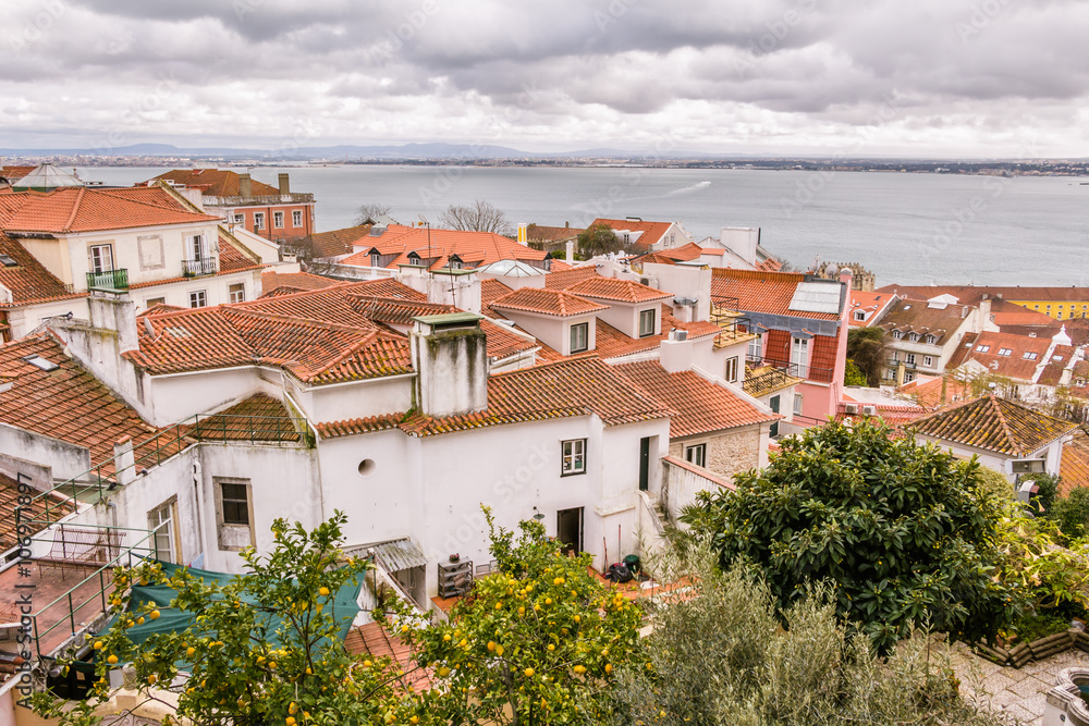 Panorama Lisbon: view from the old castle on houses and river Ta Panorama Lisbon: view from the old castle on houses and river Ta