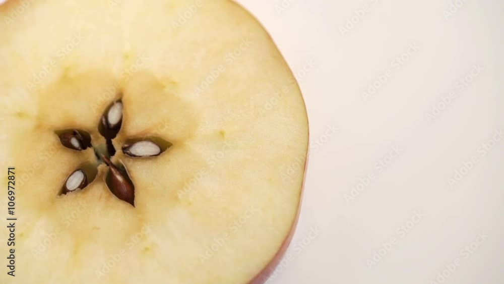 Cut red apple isolated rotation on white backround Cut red apple isolated rotation on white backround