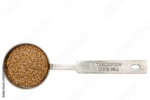 teff grain in a tablespoon