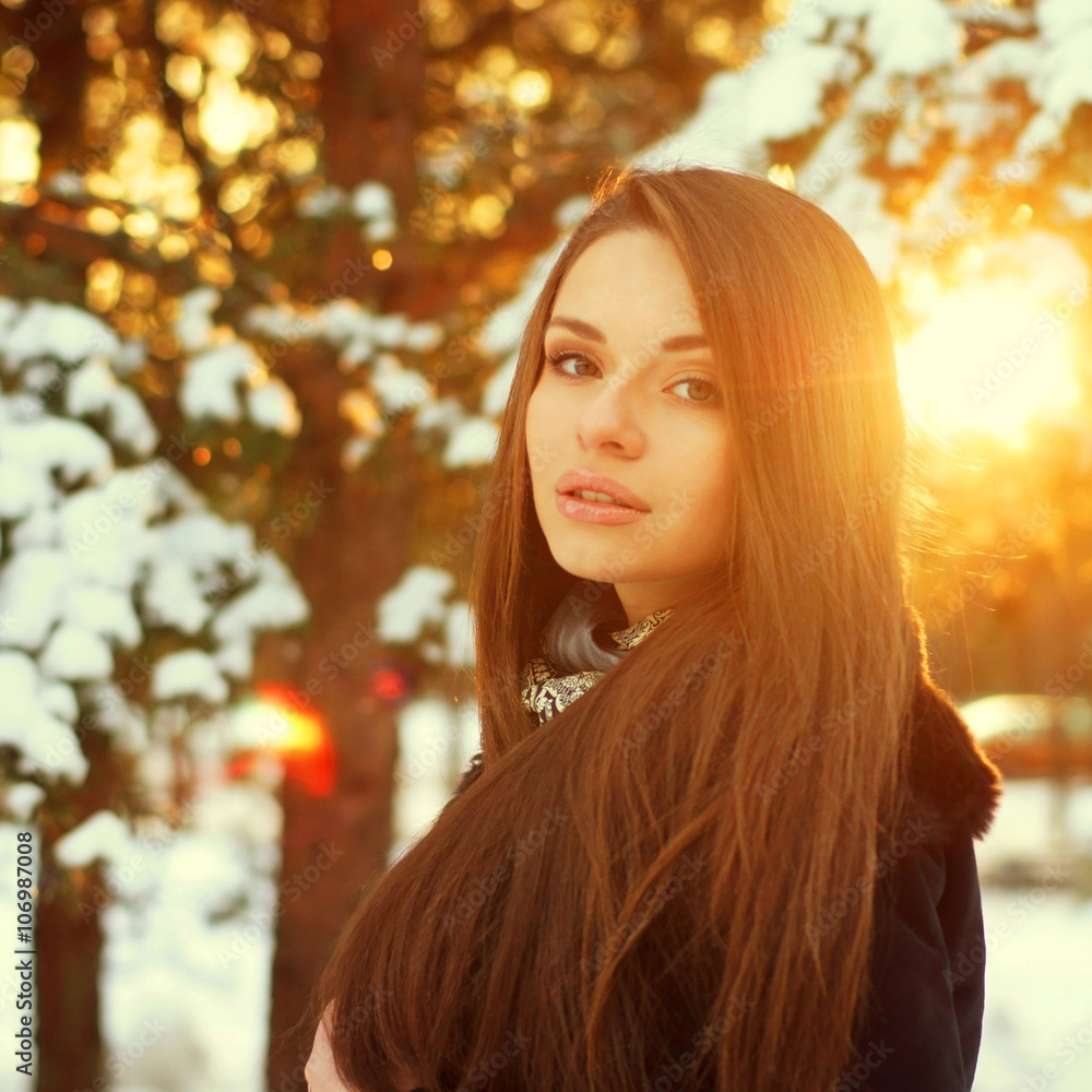 beautiful girl in winter forest