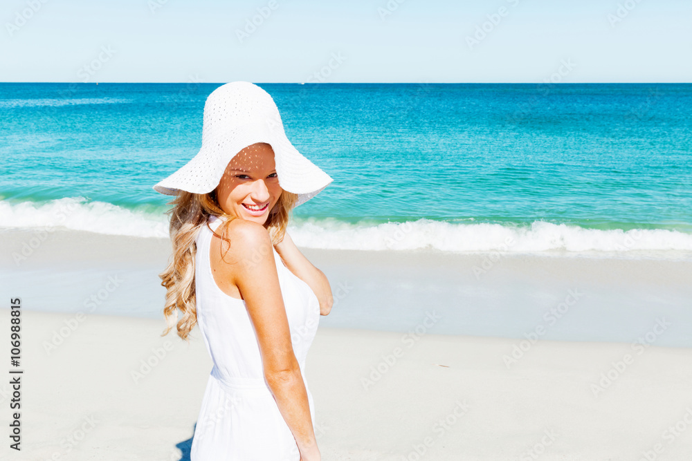 Young woman relaxing on the beach