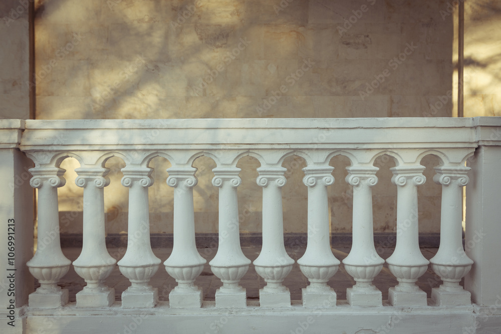 Fototapeta premium Concrete railings with yellow wall