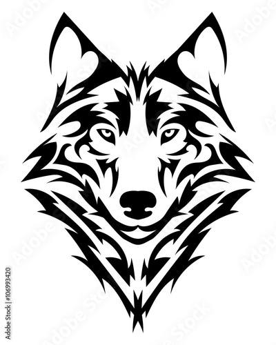Beautiful wolf tattoo.Vector wolf's head as a design element on isolated background © dark_okami