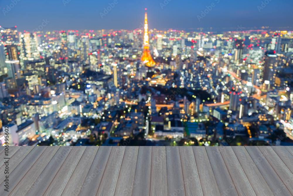 Opening wooden floor, Blurred bokeh lights background, Tokyo city downtown, Japan