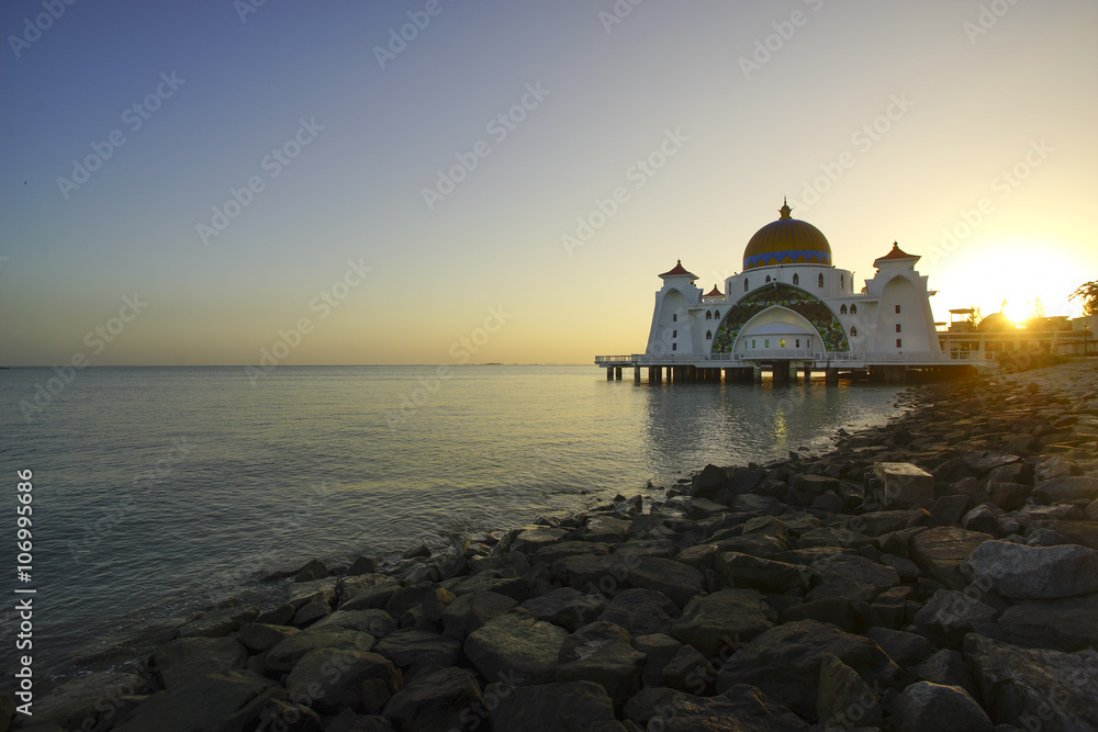 Majestic view of Malacca Straits Mosque during sunset With copys