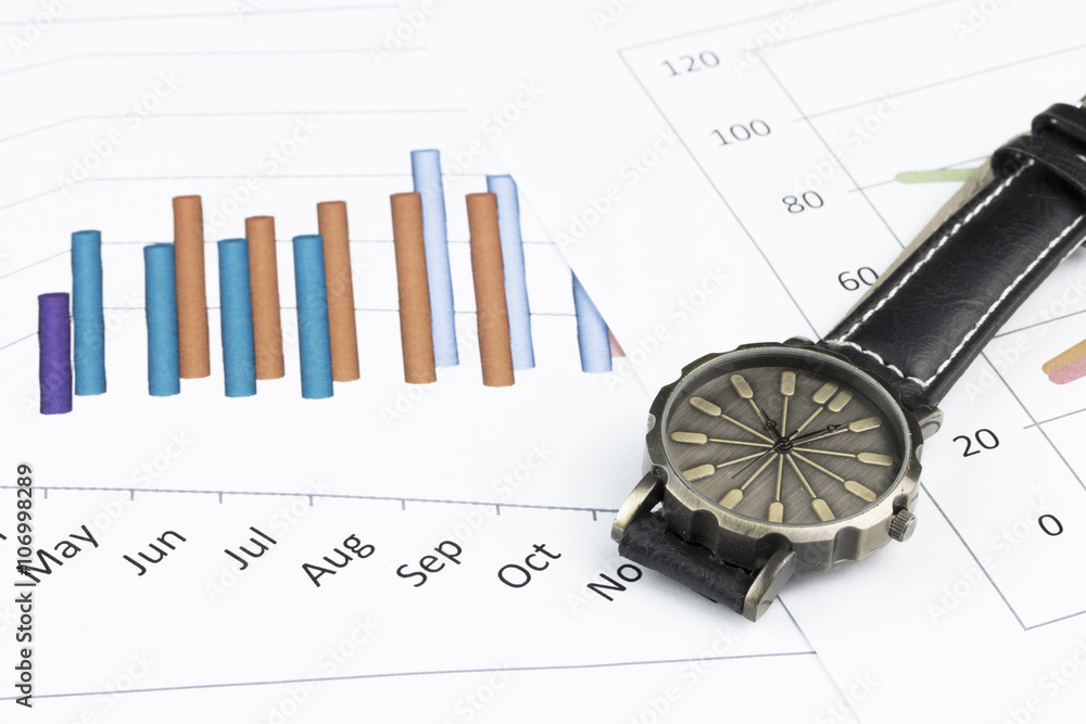 wristwatch on graph background. wristwatch on graph background.