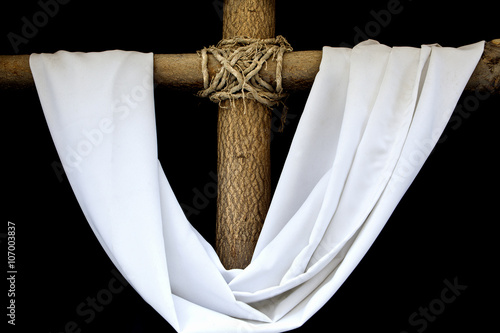 Quadro em tela Sudario blanco sobre cruz de madera