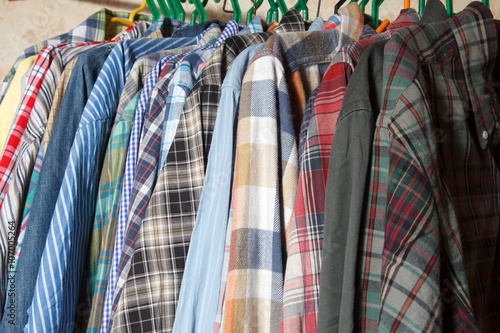 Men's shirts on hangers