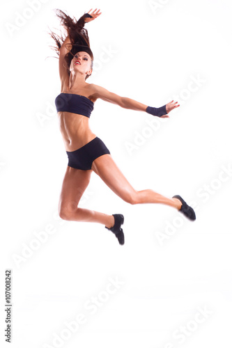 Stylish and young modern style dancer is posing