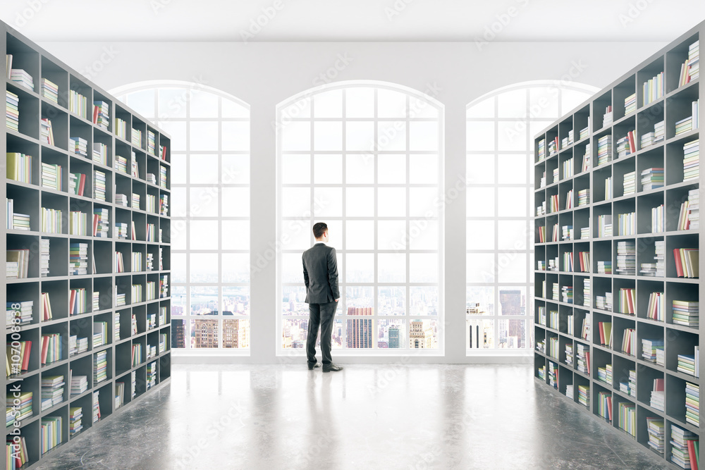 Library with businessman Library with businessman