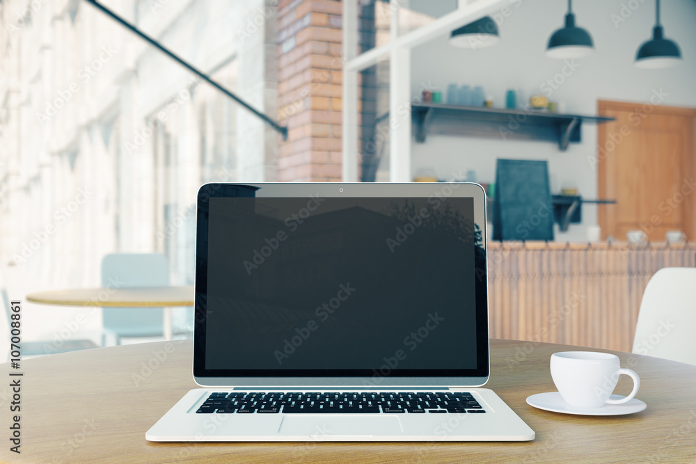 Blank laptop and coffee Blank laptop and coffee