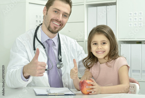 male doctor with little girl