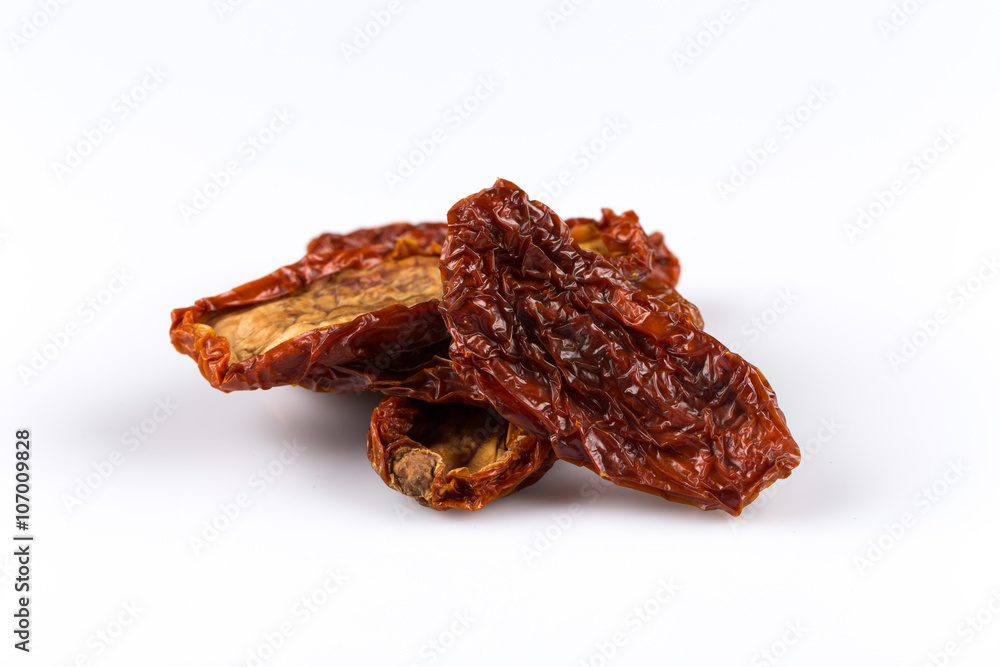 dried tomatoes on white background