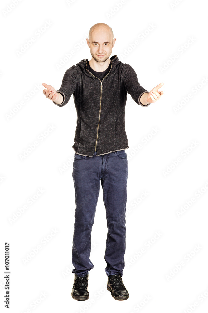 Happy smiling young man with bald head presenting or showing something.
isolated on white background Happy smiling young man with bald head presenting or showing something.
isolated on white background