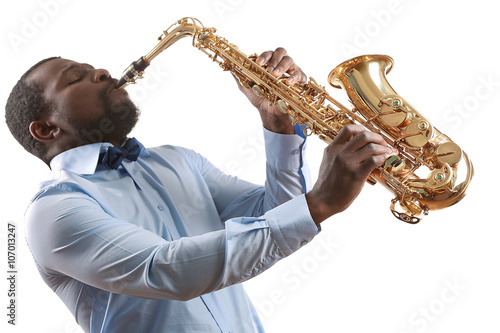 Canvas Print African American jazz musician playing the saxophone, isolated on white