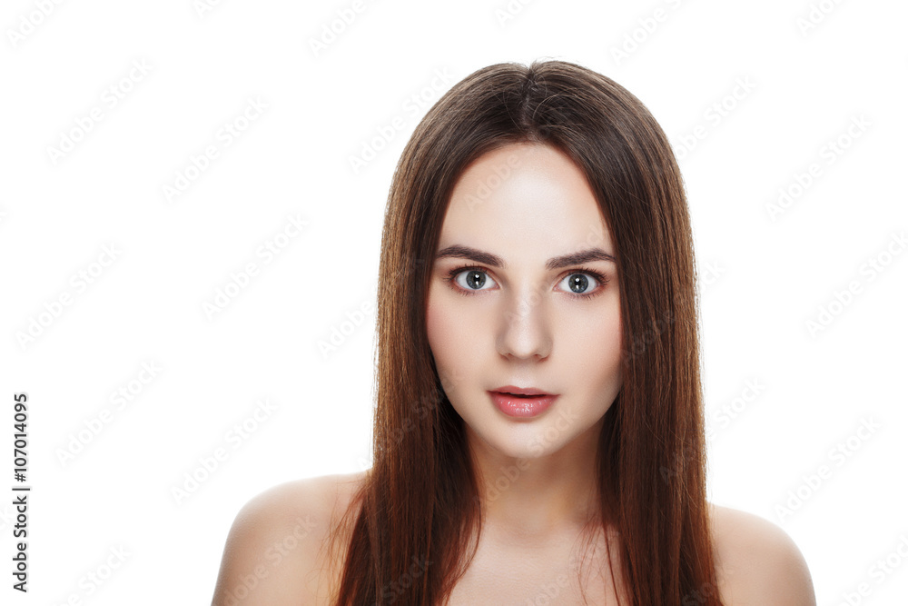 Fototapeta premium Beauty portrait of pretty girl with natural makeup. Beautiful spa woman touching her face. Perfect fresh skin. Pure beauty model girl. Youth and skin care concept