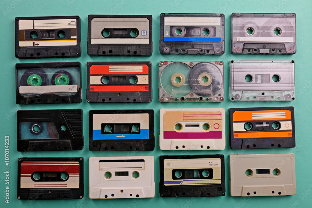 Obraz premium Set of old audio cassettes on turquoise background