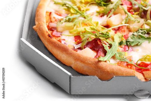 Fresh pizza in carton box closeup