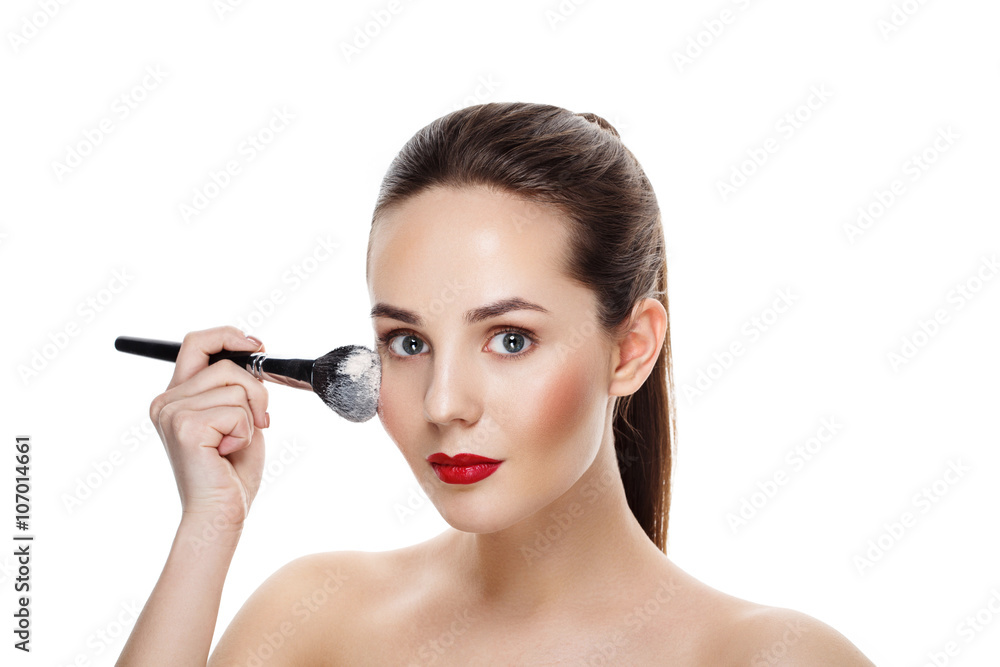 Beauty Girl with brush finish makeup apply highlighter. Bright Makeup for Brunette Woman with Beautiful Face. Makeover. Perfect Skin. Applying Make-up. Ideal for commercial Beauty Girl with brush finish makeup apply highlighter. Bright Makeup for Brunette Woman with Beautiful Face. Makeover. Perfect Skin. Applying Make-up. Ideal for commercial