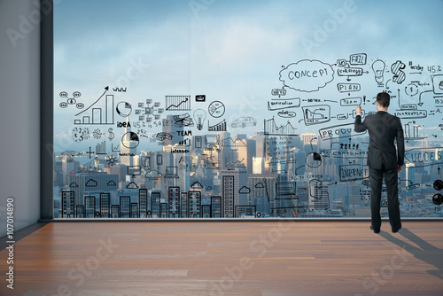 Fotografia Man drawing business scheme