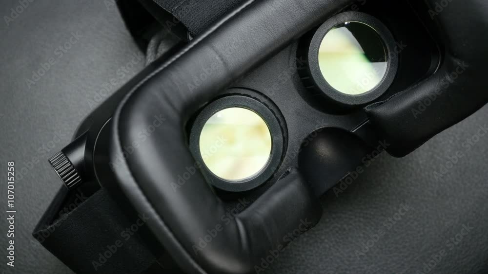 A virtual reality headset affords an immersive graphical experience. 4K UHD video.
A virtual reality headset affords an immersive graphical experience. 4K UHD video.