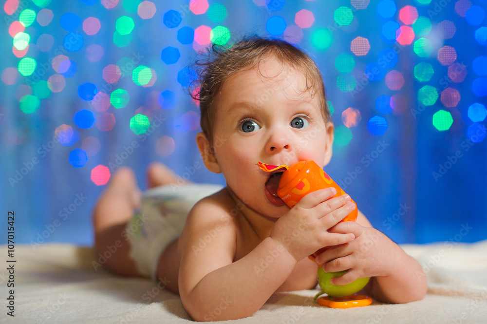 Little girl on the background of garlands Little girl on the background of garlands