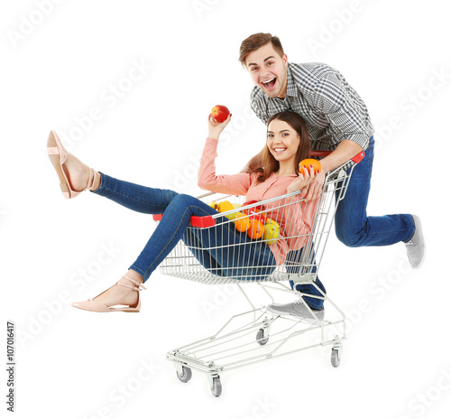 Man carrying woman in metal...