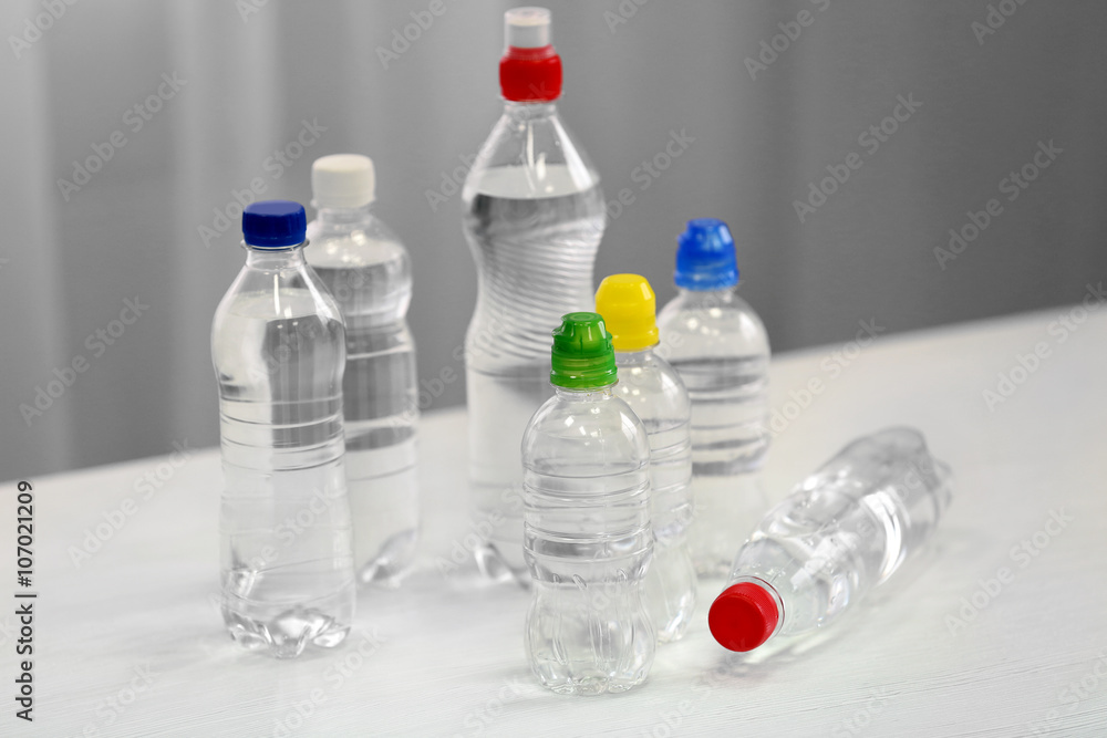 Bottles of water on the white table. Bottles of water on the white table.