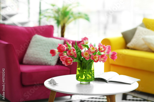 Fresh bouquet of tulips on a coffee table