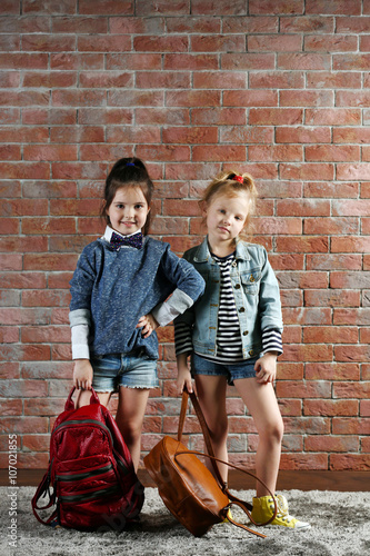 Two stylish little girls wi...