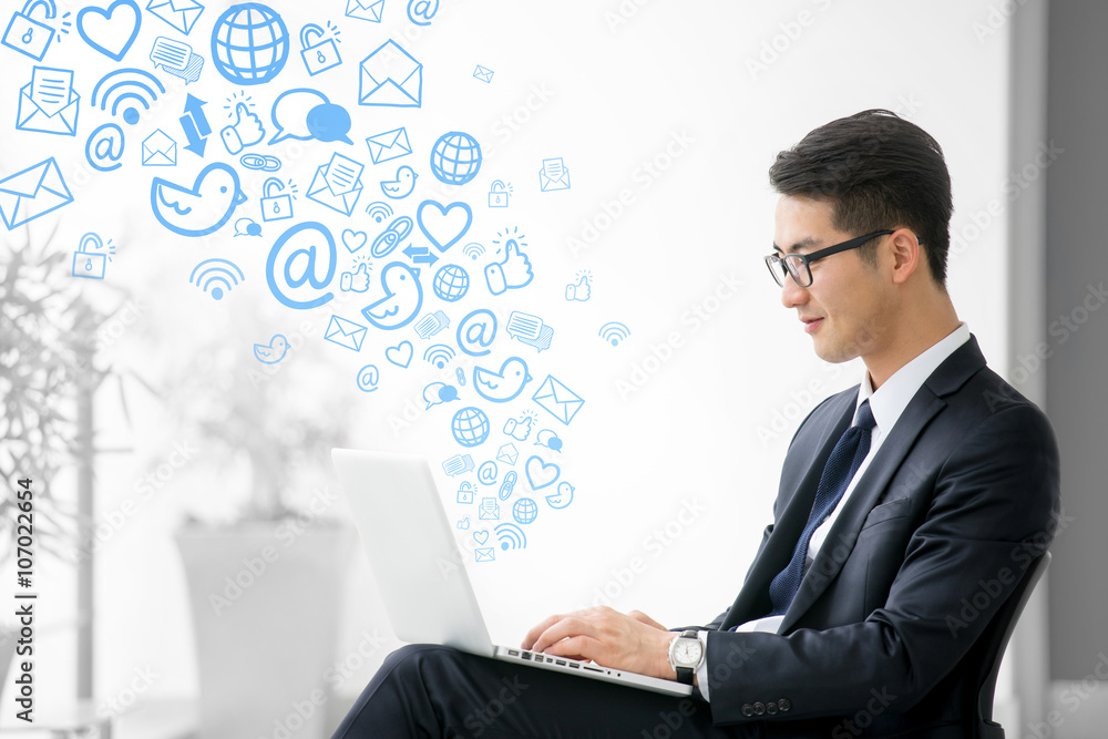 Young asian businessman using tablet, social meida Young asian businessman using tablet, social meida