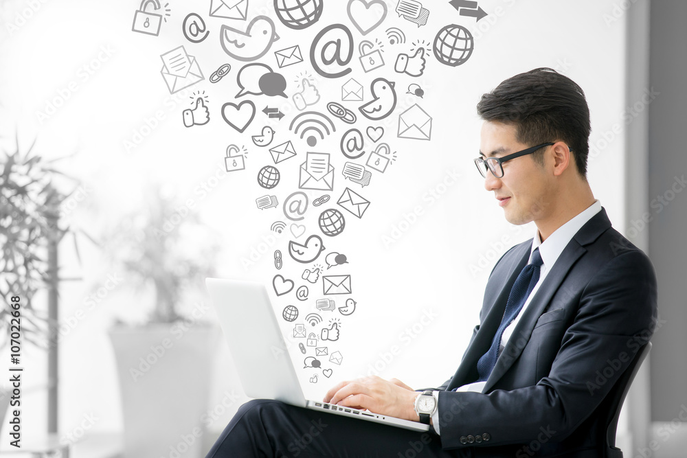 Young asian businessman using tablet, social meida Young asian businessman using tablet, social meida